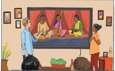 A family is watching a video on a TV. On the screen, three Indian musicians are playing traditional instruments. 